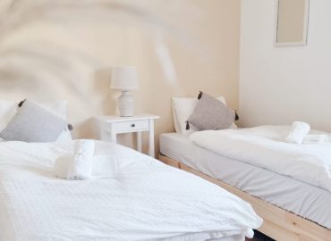 two seperate beds of a shared room